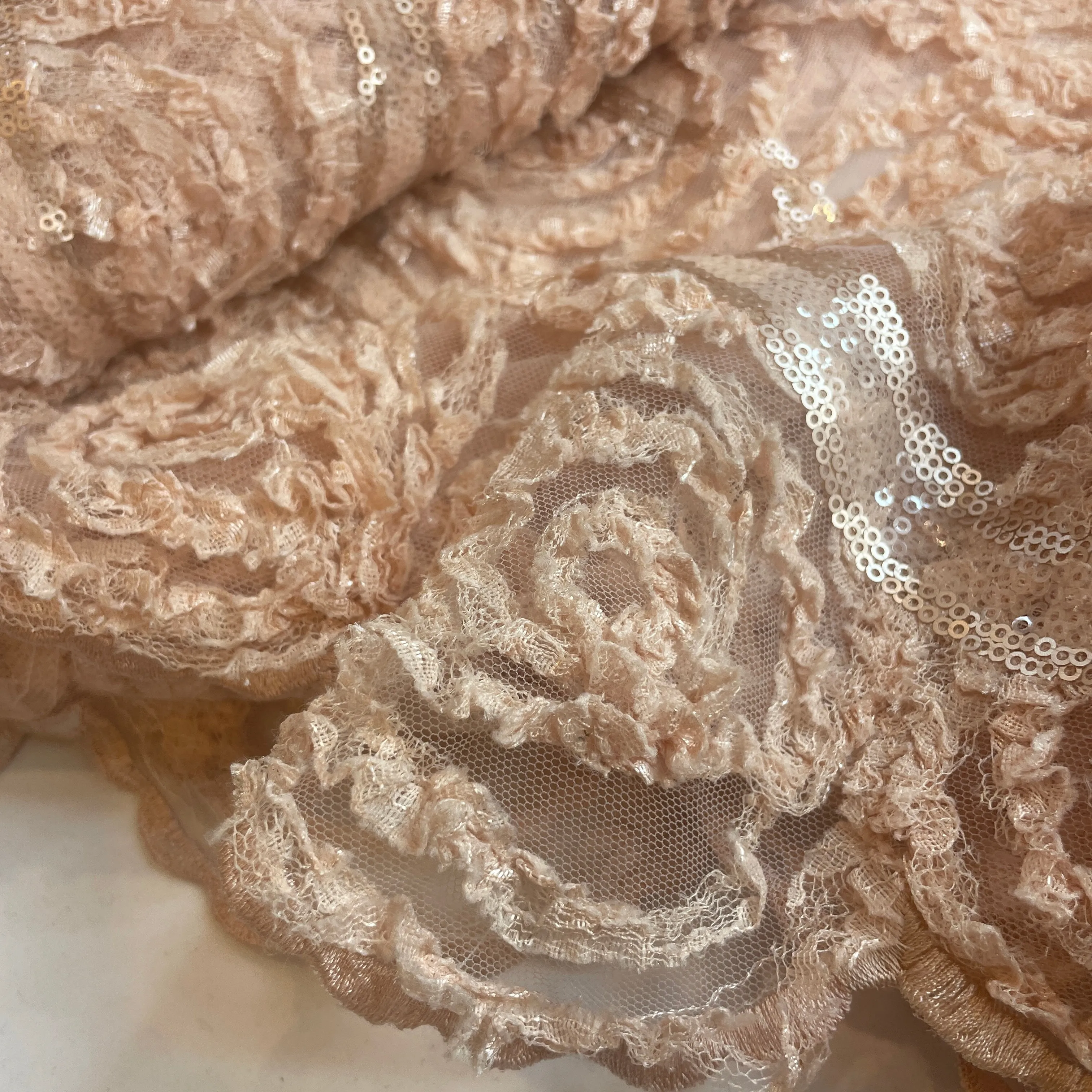 Blush pink textured rose sequin mesh